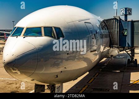 New York, USA; May 31, 2023: Japan Airlines wide-body commercial aircraft parked at John F. Kennedy International Airport at Gate 12. Stock Photo