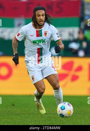 Augsburg, Germany. 16 December, 2023. Kevin Mbabu, FCA 43  in the match FC AUGSBURG - BORUSSIA DORTMUND 1-1  on Dec 16, 2023 in Augsburg, Germany. Season 2023/2024, 1.Bundesliga, FCA, BVB, matchday 15, 15.Spieltag © Peter Schatz / Alamy Live News    - DFL REGULATIONS PROHIBIT ANY USE OF PHOTOGRAPHS as IMAGE SEQUENCES and/or QUASI-VIDEO - Credit: Peter Schatz/Alamy Live News Stock Photo