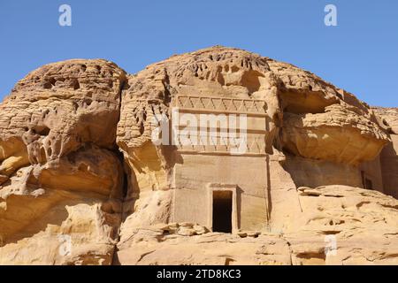 Rock cut Nabatean tomb at AlUla in Saudi Arabia Stock Photo