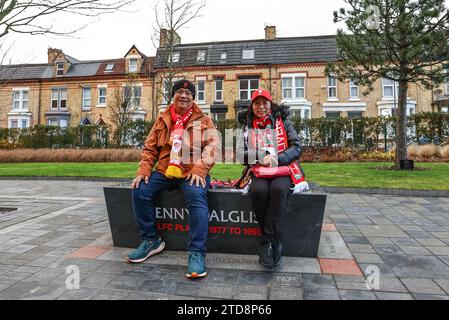 Liverpool fans sit on the Kenny Dalglish bench during the Premier League match Liverpool vs Manchester United at Anfield, Liverpool, United Kingdom, 17th December 2023  (Photo by Mark Cosgrove/News Images) Stock Photo