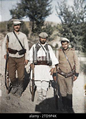 Melnik, Bulgaria Three Bulgarian Soldiers and Partisans Escorting Photographer, Clothing, HD, Human Beings, Society, Military Uniform, Balkan Wars, exists in high definition, Group Portrait, Weapon, Man, Army, Melnik, Bulgarian Soldiers & Escorting Comitadjis Mr Passet on his return from Melnik, Melnik, 20/09/1913 - 20/09/1913, Passet, Stéphane, photographer, 1913 - Balkans, Greece, Bulgarie - Stéphane Passet - (30 August-21 October), Autochrome, photo, Glass, Autochrome, photo, Positive, Vertical, Size 9 x 12 cm Stock Photo