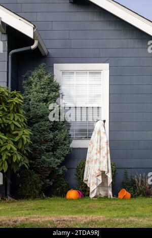 Everett WA USA Nov 3 2023 Halloween Ghost yard art decorations made with bed sheets Stock Photo