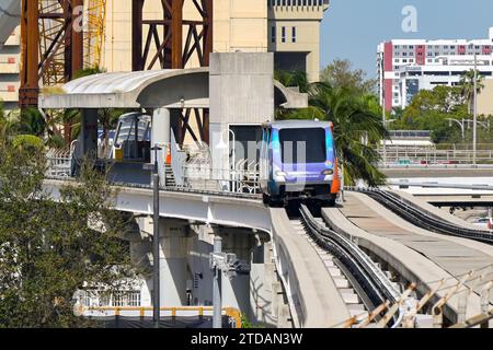 Miami, Florida, USA - 5 December 2023: Train on the city's Metromover driverless light railway transit system. It is free to ride. Stock Photo