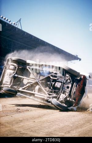 SACRAMENTO, CA - AUGUST, 1958: A car flips during a car show at the