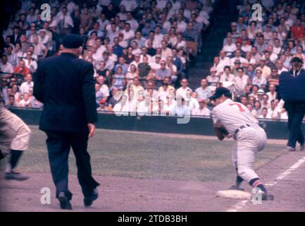 DETROIT, MI - JULY 5: Third baseman Granny Hamner #7 of the Cleveland Indians looks to put the tag down as umpire Bill Summers is there to make the call during an MLB game against the Detroit Tigers on July 5, 1959 at Briggs Stadium in Detroit, Michigan. (Photo by Hy Peskin) *** Local Caption *** Granny Hamner;Bill Summers Stock Photo