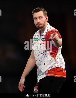 Florian Hempel reacts during his match against Dylan Slevin (not pictured) on day three of the Paddy Power World Darts Championship at Alexandra Palace, London. Picture date: Sunday December 17, 2023. Stock Photo