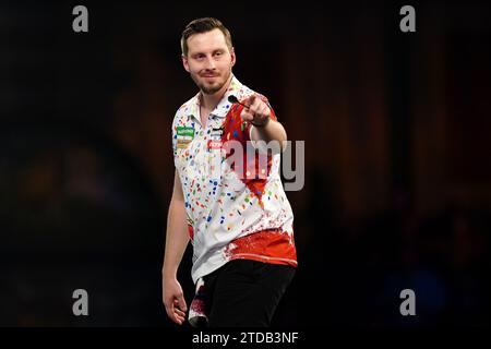 Florian Hempel reacts during his match against Dylan Slevin (not pictured) on day three of the Paddy Power World Darts Championship at Alexandra Palace, London. Picture date: Sunday December 17, 2023. Stock Photo