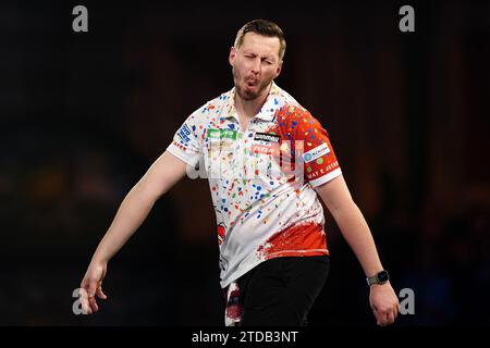 Florian Hempel reacts during his match against Dylan Slevin (not pictured) on day three of the Paddy Power World Darts Championship at Alexandra Palace, London. Picture date: Sunday December 17, 2023. Stock Photo