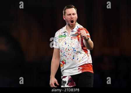 Florian Hempel reacts during his match against Dylan Slevin (not pictured) on day three of the Paddy Power World Darts Championship at Alexandra Palace, London. Picture date: Sunday December 17, 2023. Stock Photo