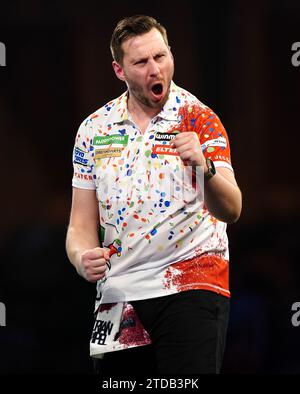 Florian Hempel reacts during his match against Dylan Slevin (not pictured) on day three of the Paddy Power World Darts Championship at Alexandra Palace, London. Picture date: Sunday December 17, 2023. Stock Photo