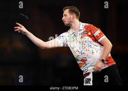 Florian Hempel reacts during his match against Dylan Slevin (not pictured) on day three of the Paddy Power World Darts Championship at Alexandra Palace, London. Picture date: Sunday December 17, 2023. Stock Photo