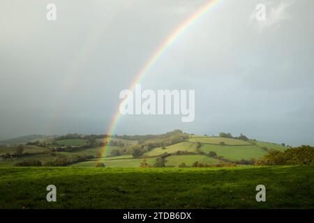 Rainbow over Countryside. Wales, UK. Stock Photo