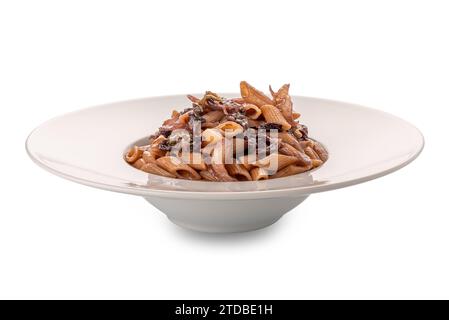 Mezze penne rigate pasta cooked with radicchio rosso veneto typical Italian recipe in white plate isolated on white with clipping path included Stock Photo