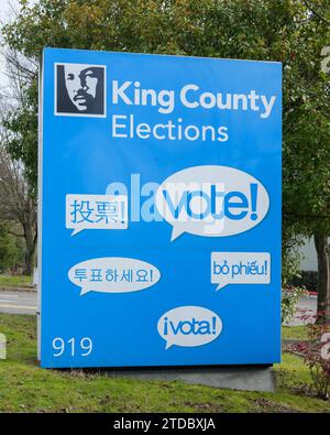 Renton, WA, USA - February 12, 2023; Closeup of Sign at King County Elections office in Renton with multiple languages Stock Photo