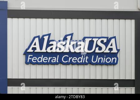 Renton, WA, USA - February 12, 2023; Sign on wall of former Alaska USA Federal Credit Union Stock Photo