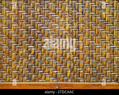 The detail of the front of a small wicker basket Stock Photo