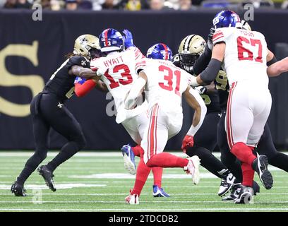 New Orleans, USA. 17th Dec, 2023. New York Giants running back Matt Breida (31) rush for some yardage during a National Football League game at the Caesars Superdome in New Orleans, Louisiana on Sunday, December 17, 2023. (Photo by Peter G. Forest/Sipa USA) Credit: Sipa USA/Alamy Live News Stock Photo