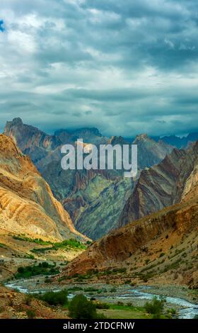 A river meanders through a mountain range in the Zanskar region of Ladakh, India. Stock Photo