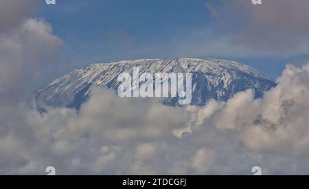 closeup view of mount kilimanjaro showing white snow capped uhuru peak from amboseli national park kenya Stock Photo