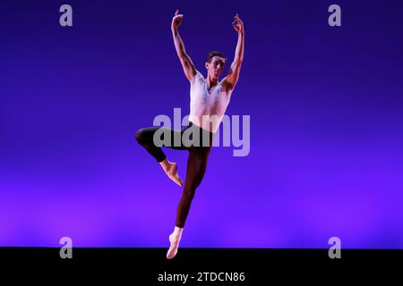 Male Ballet Dancer Jumping In Passé Stock Photo