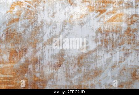 Rust dirty metal wall is used as old metal background texture. Stock Photo