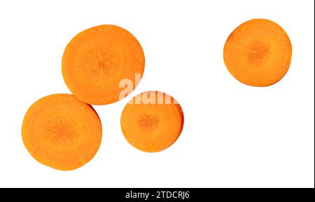 Top view of beautiful orange carrot slices in set is isolated on white background with clipping path. Stock Photo