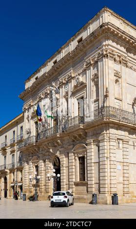 Syracuse, Sicily, Italy - February 16, 2023: Municipality Town Hall Palazzo del Vermexio Municipio at Piazza Duomo square on ancient Ortigia island Stock Photo