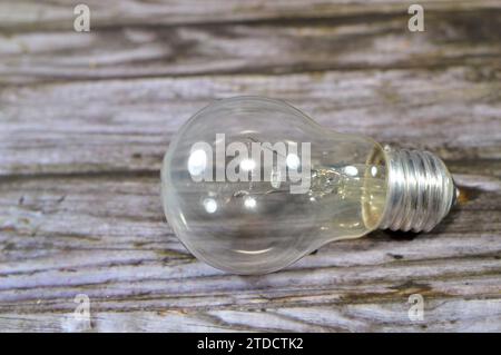 incandescent light globe bulb lamp, an electric light with a wire filament tungsten that is heated until it glows, consists of gas bulb, low pressure Stock Photo