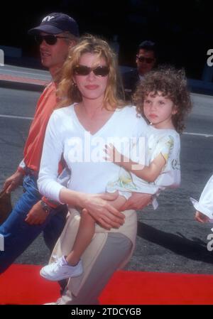 Culver City, California, USA 28th July 1996 Dan Gilroy, Actress Rene Russo and daughter Rose Gilroy attend Matilda Premiere at Mann Culver Theater on July 28, 1996 in Cuvler City, California, USA. Photo by Barry King/Alamy Stock Photo Stock Photo