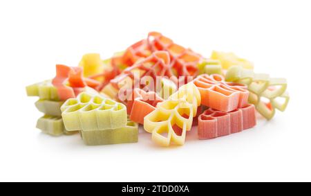 Uncooked raw pasta. Various Christmas shapes. Pasta isolated on the white background. Stock Photo