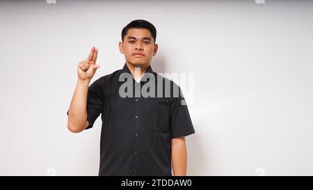asian man is using sign language with hand. learn sign language by hand. ASL American Sign Language Stock Photo