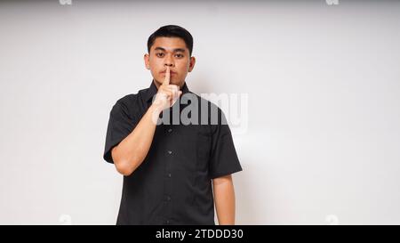 asian man is using sign language with hand. learn sign language by hand. ASL American Sign Language Stock Photo