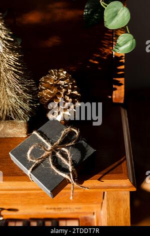 Small gift box on piano for christmas holidays Stock Photo