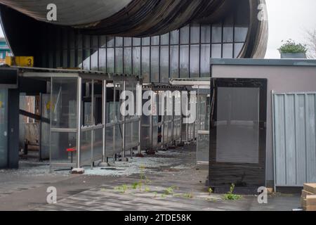 Slough, Berkshire, UK. 16th December, 2023. Slough Bus Station was set alight by arsonists and remains out of use. Slough has recently been named Britain's ugliest town and also the unhealthiest town. Ugly high rise blocks of flats are springing up around the town. Slough Borough Council are effectively bankrupt and have been selling off a number of sites and buildings across the town. Credit: Maureen McLean/Alamy Stock Photo