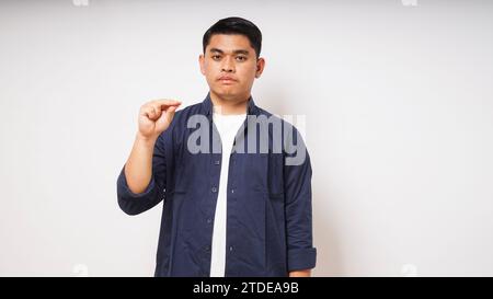 asian man is using sign language with hand. learn sign language by hand. ASL American Sign Language Stock Photo