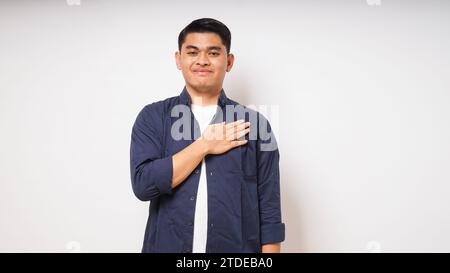 asian man is using sign language with hand. learn sign language by hand. ASL American Sign Language Stock Photo