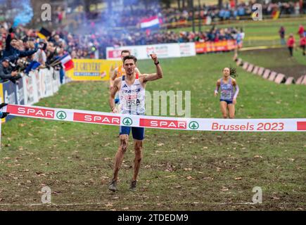 Alexis Miellet of France crosses the finishing line to help his team win gold in the mixed relay race at the SPAR European Cross Country Championships Stock Photo