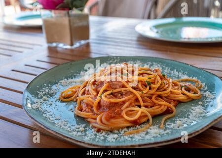 a close up image of a plate of spaghetti Bolognese in a mediterranean restaurant Stock Photo