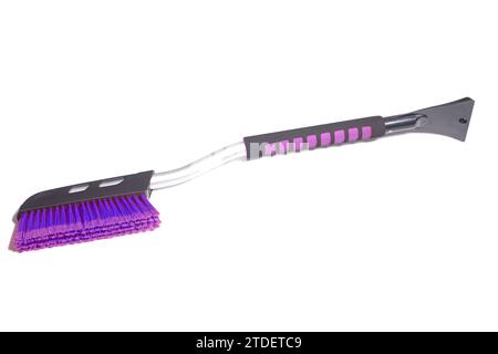 Car brush with a scraper for cleaning the car in winter about snow and ice, isolated on white Stock Photo