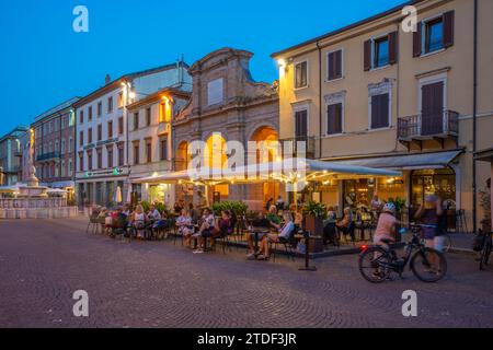 View of restaurant in Piazza Cavour in Rimini at dusk, Rimini, Emilia-Romagna, Italy, Europe Stock Photo