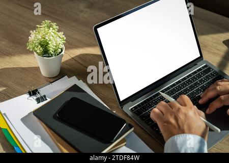 Businessman using a desktop computer of the blank screen device isolated screen ONLINE ADVERTISING Stock Photo