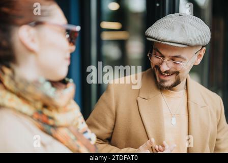 Multiracial colleagues collaborating outdoors, discussing ideas, planning for success in a small business. Stock Photo