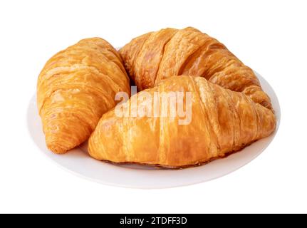 Appetizing croissants in white plate are isolated on white background with clipping path. Stock Photo