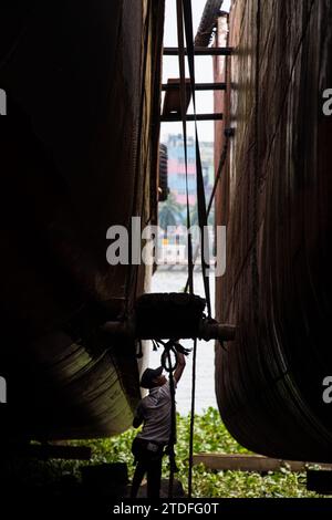 Daily lifestyle of dockyard people of Bangladesh. This image was captured from Dhaka, Bangladesh on July 30, 2022. Stock Photo