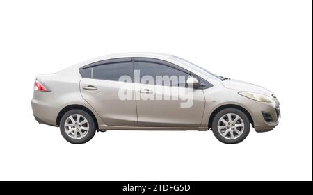 Gray sedan car in the rain is isolated on white background with clipping path. Stock Photo