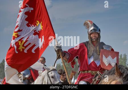 Sword-bearer of Polish Crown leaving battleground after recreating Battle of Grunwald which took place in 1410 when Polish and Lithuanian troops broke the power of Teutonic Knights, near village of Grunwald Warminsko-Mazurskie, Poland Stock Photo