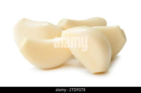 Peeled garlic cloves in stack are isolated on white background with clipping path Stock Photo