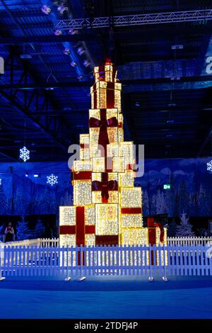 Christmas tree made of present boxes at Kingdom of Winter Christmas market at the ExCeL Centre, London, England Stock Photo