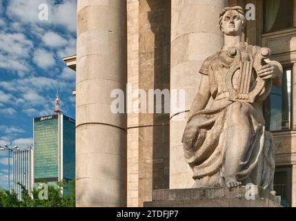 Socialist-realist style statue of heroic muse at Palace of Culture and Science, a symbol of Soviet domination in the past, Warsaw, Poland Stock Photo