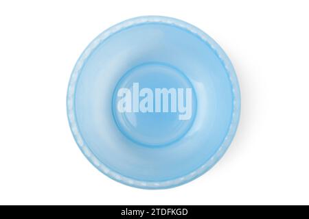 Blue plastic bowl closeup isolated on white background. View from above Stock Photo